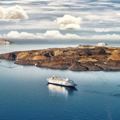 Beautiful Landscape with Sea View. Cruise Liner at the Sea of Santorini.